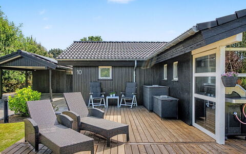 Frederikke - 875M from the Sea: Roof, House, Home, Cottage, Door, Siding, Deck, Porch, Plank, Hardwood