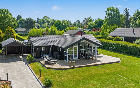 Frederikke - 875M from the Sea: Roof, House, Home, Cottage, Door, Siding, Deck, Porch, Plank, Hardwood