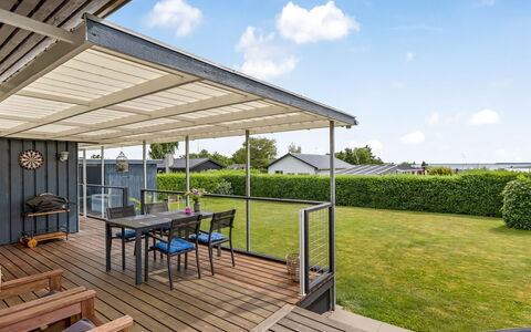 Nielsine - 250M from the Sea: Roof, Shade, Composite Material, Deck, Porch, Outdoor Furniture, Patio, Outdoor Structure, Awning, Hardwood