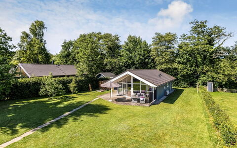 Alfwin - 300M from the Sea: Roof, House, Home, Cottage, Siding, Estate, Driveway, Garden Buildings, Yard, Shed