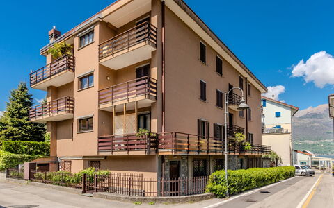 Casa al Lago: Building, Window, Apartment, Facade, Residential Area, Neighbourhood, Town, Architecture, Balcony, Urban Design