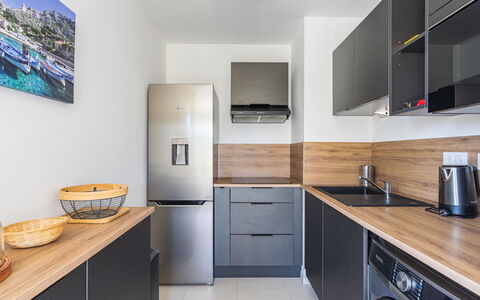 Le Lavandou 450: Countertop, Kitchen, Interior Design, Major Appliance, Cabinetry, Furniture, Kitchen Appliance, Flooring, Wood, Home Appliance