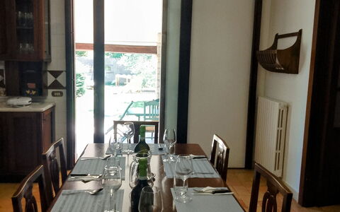 Villa Ginevra: Furniture, Table, Wood, Interior Design, Dining Room, Flooring, Chair, Kitchen & Dining Room Table, Lighting, Floor