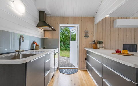 Blesse - 500M to the Fjord: Wood, Flooring, Kitchen, Countertop, Floor, Interior Design, Kitchen Appliance, Major Appliance, Cabinetry, Furniture