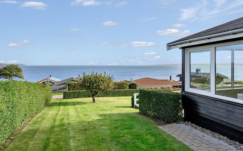 Fani - 150M from the Sea: Sea, Coastal And Oceanic Landforms, Home, Coast, Groundcover, Ocean, Cottage, Lawn, Shore, Estate