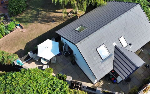 Torino Lodge: Roof, House, Home, Shrub, Cottage, Solar Energy, Shade, Garden, Solar Power