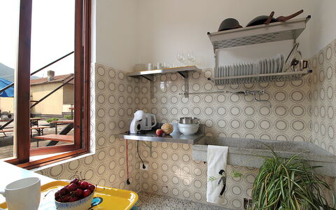Casa Zaira: Flooring, Interior Design, Floor, Kitchen, Room, Countertop, Tile, Kitchen Appliance, Tap, Wood Stain