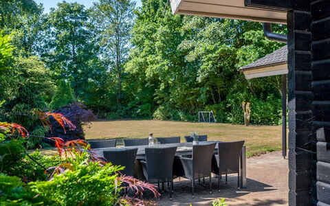 Lillebror - 12Km from the Sea: Shrub, Garden, Shade, Land Lot, Groundcover, Chair, Lawn, Landscaping, Yard, Backyard