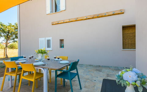 Castagneto Carducci 50: Furniture, Chair, Outdoor Furniture, Table, Kitchen & Dining Room Table, Outdoor Table, Restaurant, Patio, Dining Room, Shade