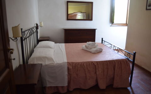 Oasi Della Pergola: Bed, Bedroom, Furniture, Bedding, Bed Sheet, Floor, Wood, Interior Design, Flooring, Bed Frame