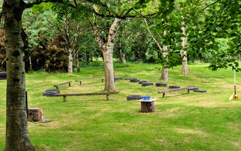 Oak Lotus Belle Tent: Grass, Wood, Outdoor Bench, Picnic Table, Trunk, Bench, Groundcover, Park, Garden, Outdoor Table