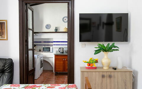 Villa Estévez: Furniture, Interior Design, Room, Floor, Flooring, Table, Chair, Picture Frame, Apartment, Wood Stain