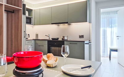 Juliana 90.4: Kitchen, Interior Design, Furniture, Kitchen Appliance, Countertop, Major Appliance, Ceiling, Cabinetry, Lighting, Flooring