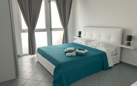 Case Martorelli - Belvedere Marittimo: Furniture, Floor, Flooring, Interior Design, Room, Bedroom, Bed, Bedding, Chair, Bed Frame