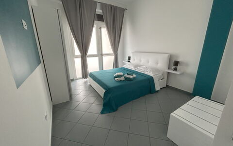 Case Martorelli - Belvedere Marittimo: Furniture, Floor, Flooring, Interior Design, Room, Bedroom, Bed, Apartment, Chair, Bedding