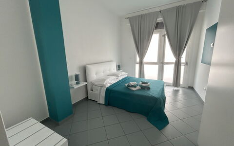 Case Martorelli - Belvedere Marittimo: Furniture, Floor, Flooring, Interior Design, Room, Ceiling, Bedroom, Apartment, Bed, Chair