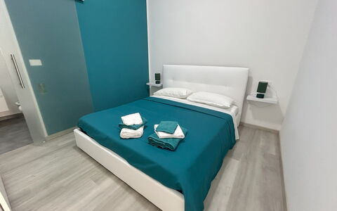 Case Martorelli - Belvedere Marittimo: Floor, Flooring, Furniture, Interior Design, Bedroom, Room, Bed, Bedding, Apartment, Bed Sheet