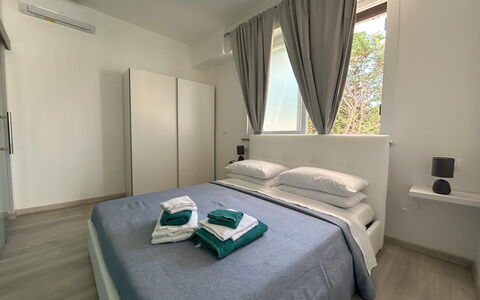 Case Martorelli - Belvedere Marittimo: Interior Design, Floor, Bed, Bedroom, Flooring, Furniture, Room, Apartment, Bedding, Ceiling