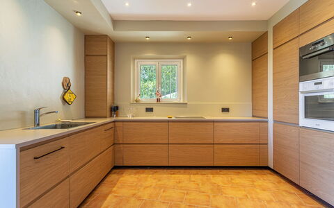 Manureva: Cabinetry, Flooring, Kitchen, Countertop, Interior Design, Wood, Floor, Kitchen Appliance, Furniture, Cupboard