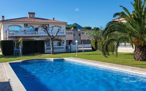 Miami Platja 816: Water, Plant, Sky, Property, Blue, Building, Azure, Swimming Pool, Shade, Tree