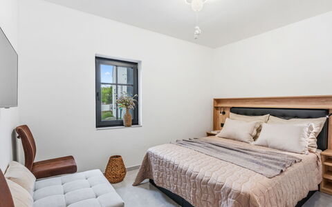 Luxury Retreat Resort: Furniture, Bed, Interior Design, Bedroom, Flooring, Floor, Wall, Bedding, Room, Wood