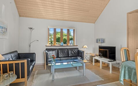 Elviira - 200M from the Sea: Furniture, Interior Design, Flooring, Wood, Couch, Ceiling, Floor, Room, Living Room, Lighting