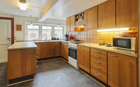 Henrieke - 10Km from the Sea: Kitchen, Countertop, Flooring, Kitchen Appliance, Cabinetry, Wood, Major Appliance, Floor, Interior Design, Ceiling