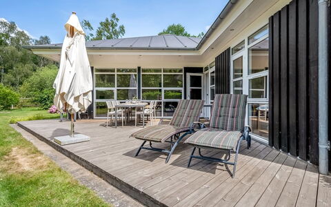 Jyrki - 100M from the Sea: Wood, Home, Shade, Porch, Deck, Door, Chair, Hardwood, Garden, Estate