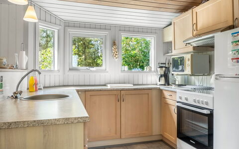 Saila - 1.2Km from the Sea: Kitchen, Countertop, Kitchen Appliance, Interior Design, Flooring, Wood, Major Appliance, Cabinetry, Ceiling, Plumbing Fixture
