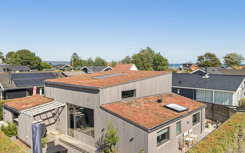 Elvie - 150M from the Sea: Wood, Home, Porch, Deck, Hardwood, Roof, Wood Stain, Wood Flooring, Eco Hotel