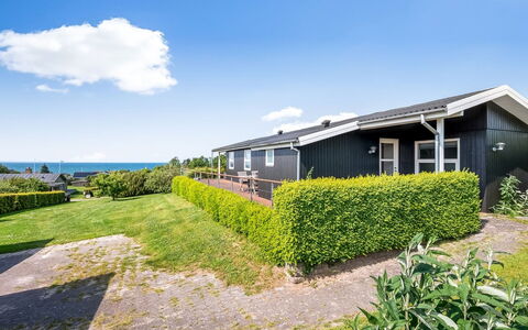 Akira - 250M from the Sea: House, Home, Door, Roof, Cottage, Estate, Garden, Shade, Siding, Yard