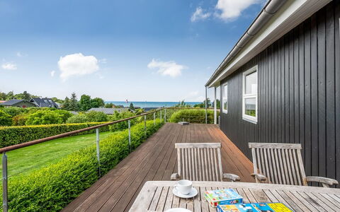 Akira - 250M from the Sea: House, Home, Door, Roof, Cottage, Estate, Garden, Shade, Siding, Yard