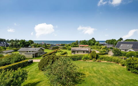 Akira - 250M from the Sea: House, Home, Door, Roof, Cottage, Estate, Garden, Shade, Siding, Yard