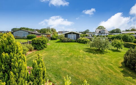 Akira - 250M from the Sea: House, Home, Door, Roof, Cottage, Estate, Garden, Shade, Siding, Yard