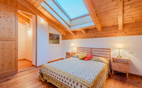 Terme di Comano 104: Interior Design, Wood, Ceiling, Flooring, Floor, Bedroom, Room, Bed, Attic, Home