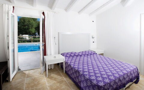Villa Fico D'india 2: Furniture, Floor, Flooring, Apartment, Swimming Pool, Resort, Bed, Bedroom, Hotel, Chair