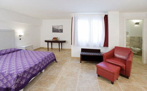 Villa Leccio 1: Furniture, Interior Design, Flooring, Floor, Ceiling, Room, Bedroom, Bed, Lighting, Table