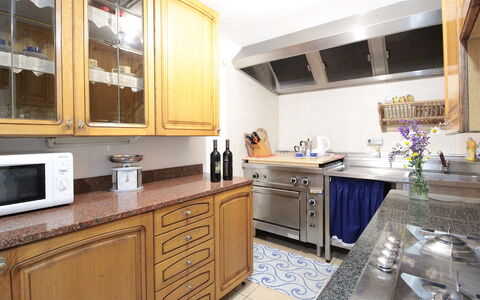 Baita Costa Di Gial: Countertop, Kitchen, Cabinetry, Kitchen Appliance, Furniture, Major Appliance, Kitchen Sink, Interior Design, Wood, Flooring