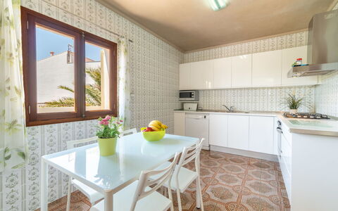 Villa Can Rosito: Flooring, Interior Design, Floor, Furniture, Room, Ceiling, Kitchen, Kitchen & Dining Room Table, Countertop, Tile