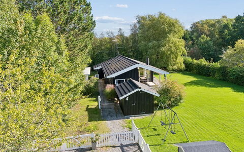 Erko - 575M from the Sea: Shrub, House, Home, Roof, Cottage, Garden, Groundcover, Lawn, Estate, Shade