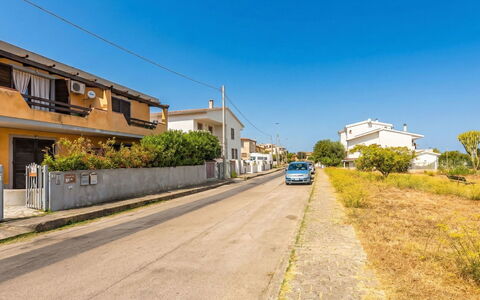 Angela House: Sky, Residential Area, Road, Neighbourhood, Town, Home, Street, Asphalt, Human Settlement, Thoroughfare