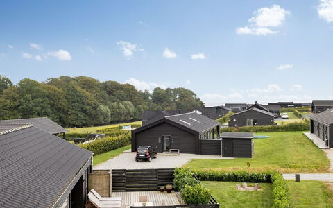 Sigrun - 300M from the Sea: Roof, House, Home, Cottage, Siding, Estate, Driveway, Garden Buildings, Yard, Shed