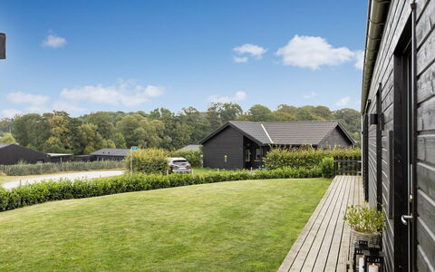Sigrun - 300M from the Sea: Roof, House, Home, Cottage, Siding, Estate, Driveway, Garden Buildings, Yard, Shed