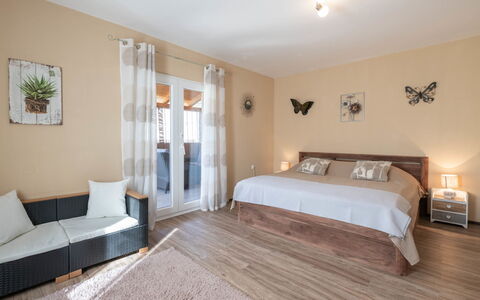 Badi: Furniture, Interior Design, Floor, Flooring, Bed, Wood, Room, Ceiling, Bedroom, Lighting