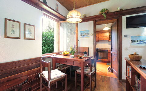 Chalet Giove: Furniture, Interior Design, Wood, Flooring, Floor, Ceiling, Table, Chair, Lighting, Dining Room