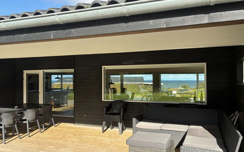 Siljan - 400M from the Sea: Home, Door, Porch, Wood Stain, Shade, Deck, Hardwood, Plank, Chair, Home Door