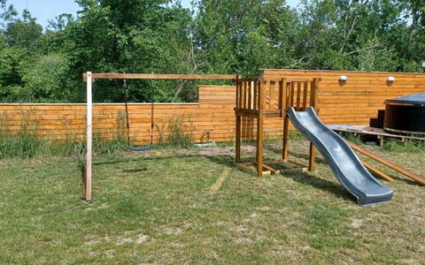 Wolter - 1.7Km from the Sea: Wood, Outdoor Play Equipment, Playground Slide, Public Space, Playground, Garden, Chute, Backyard, Lawn, Wood Stain