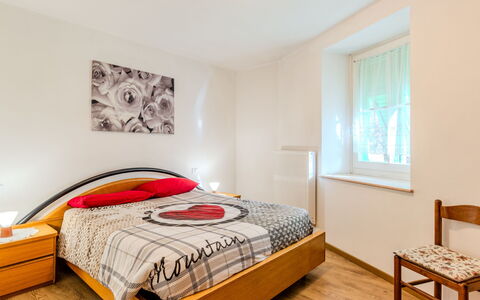 Relax tra i Monti: Bed, Interior Design, Bedroom, Furniture, Bedding, Bed Sheet, Room, Wood, Flooring, Floor