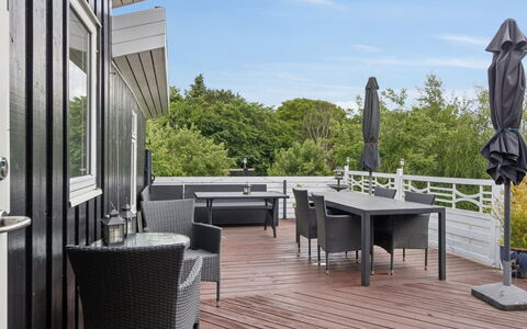 Rikhard - 175M to the Fjord: Wood, Furniture, Wood Flooring, Flooring, Floor, Outdoor Furniture, Porch, Hardwood, Table, Deck