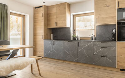 Jagerstüberl-60Qm Eg mit Gr Terrasse 649.1: Wood, Flooring, Furniture, Cabinetry, Floor, Countertop, Kitchen, Wood Flooring, Drawer, Hardwood